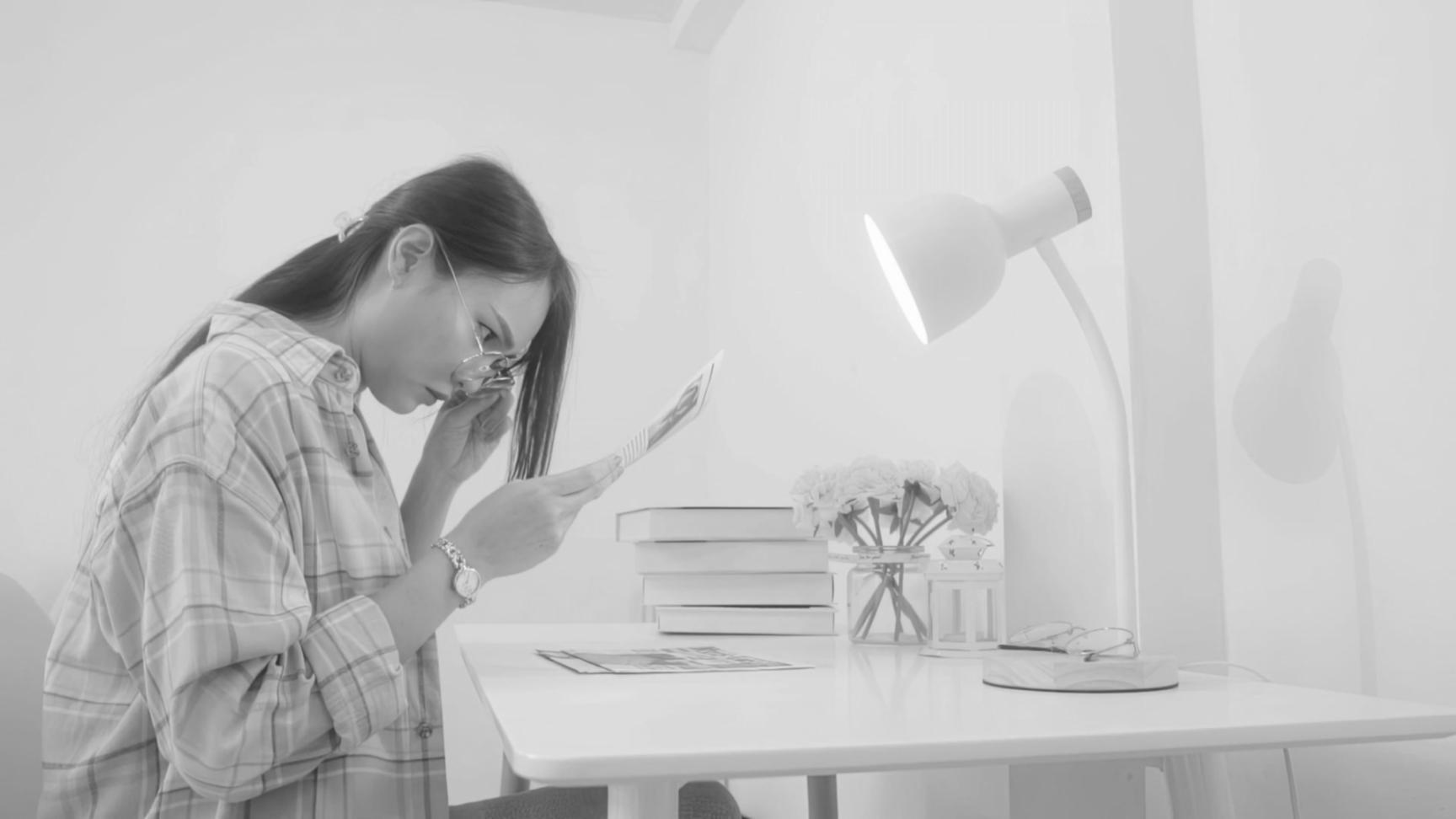 Business professionals analyzing financial data on multiple screens in modern office environment