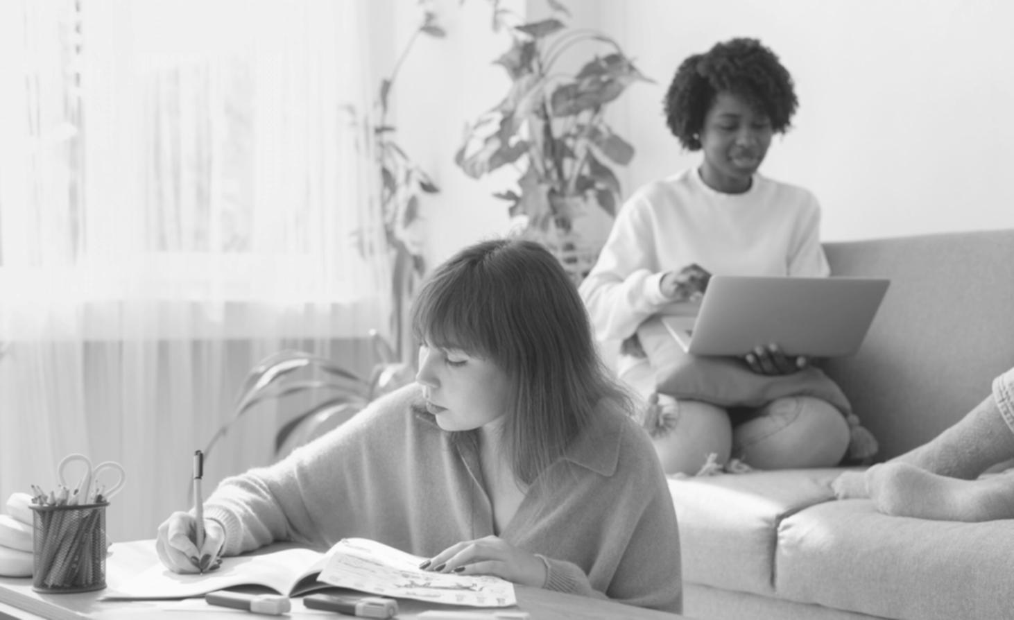 Financial advisor explaining investment concepts with charts and graphs on multiple screens