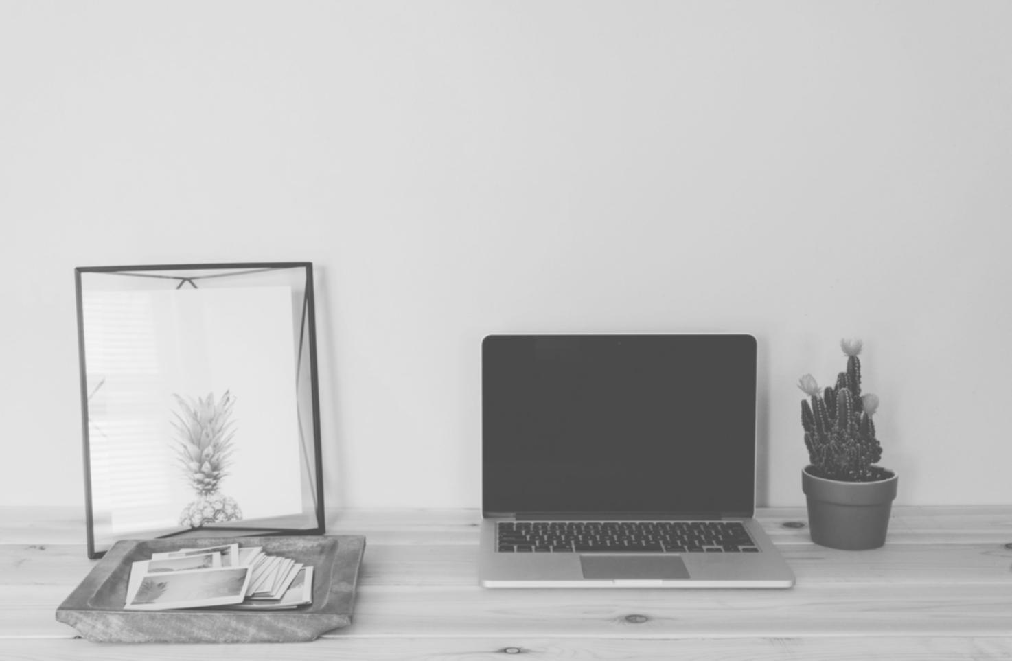 Close-up of hands using smartphone and laptop for digital banking and financial apps